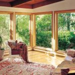 living room with four-panel large glass windows on a sunny day