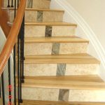 Staircase featuring hickory treads and travertine risers.