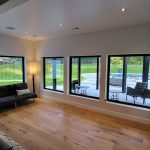 large square glass windows in the living room