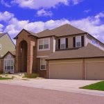 facade of a home with light brown walls