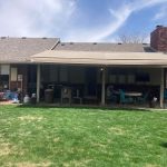 awning connected to the roof as extension shade