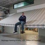 man sitting on installed awning