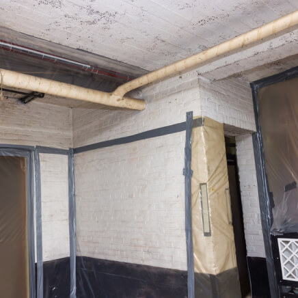 asbestos-removal-works-heating-pipes-insultation-going-basement-all-walls