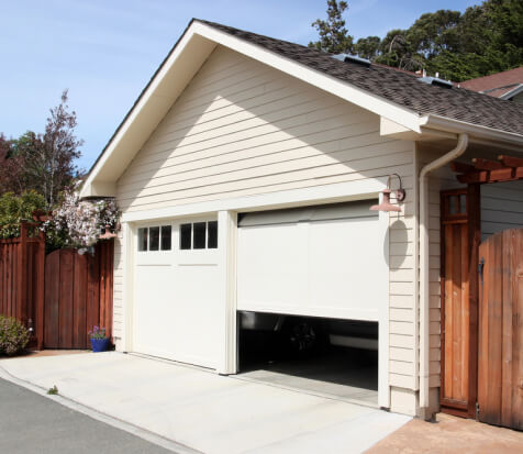 Half-open garage door in a residential house in Denver