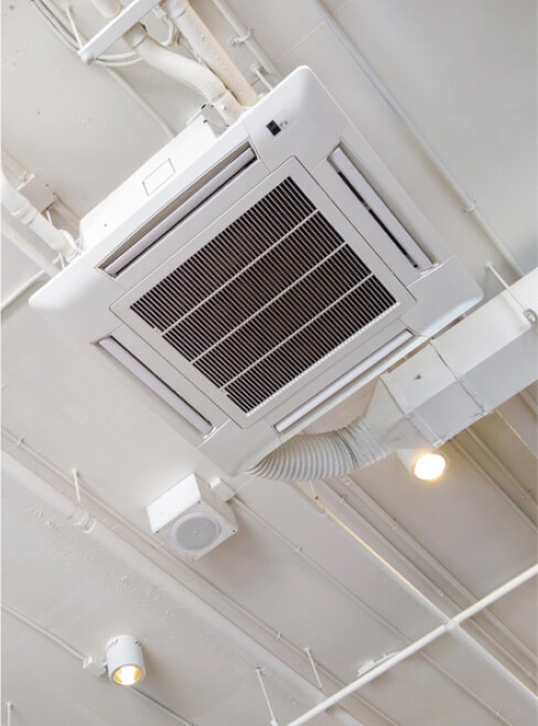 white-industrial-air-conditioner-cooling-pipe-plumbing-ceiling-ventilation-system