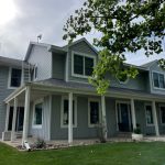 Front of a home showcasing new windows and siding