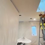 before and after photos of a painted wall