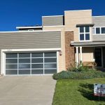 Newly painted house with garage next to the main entrance