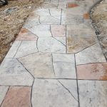 flagstone walkway installed on a concrete base