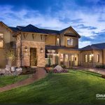 facade of a large house with landscape and walkway