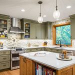 kitchen design with green cabinets and drawers