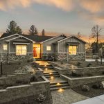 facade of a house with concrete steps leading to main door