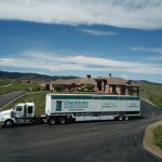 Checkmate Moving and Storage truck on the road